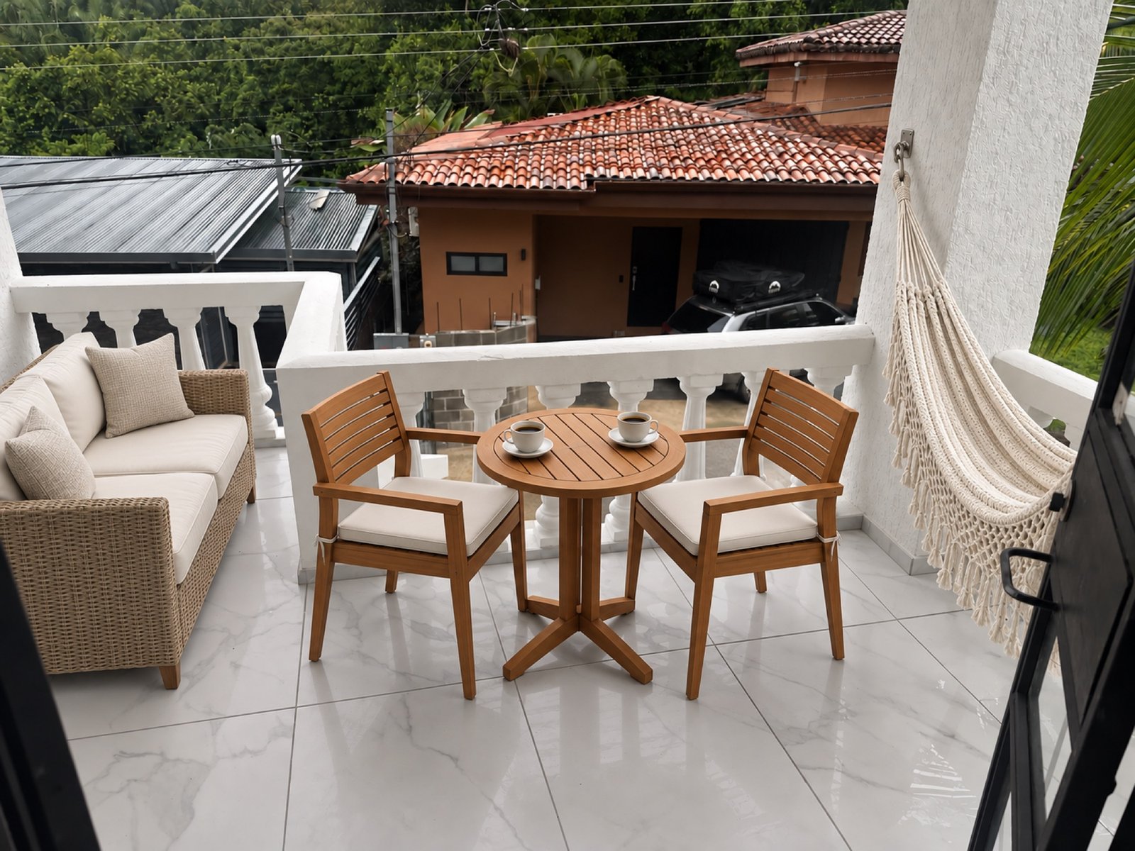 Covered terrace arranged for outdoor dining